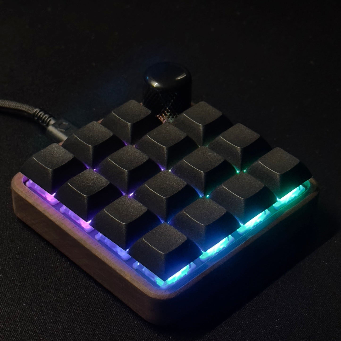 KLAWOS keyboard with RGB lighting on a dark background